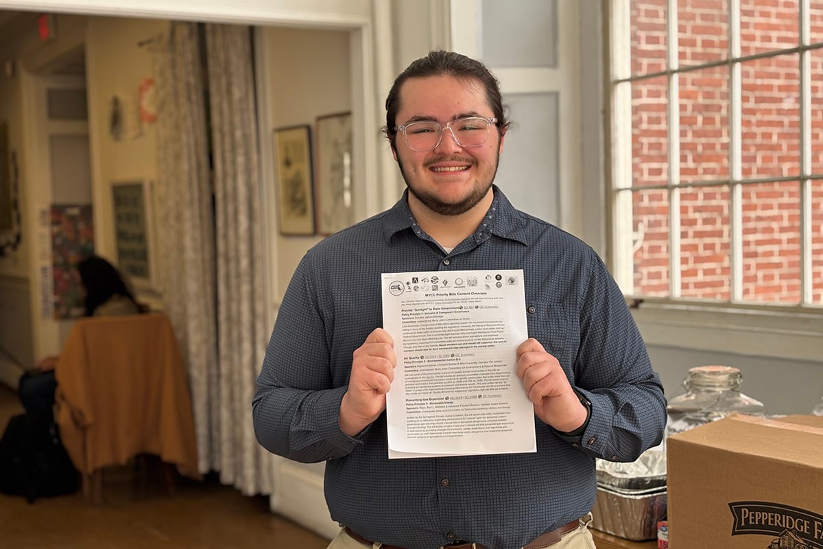 Nicholas Bittner holds up a document with lobby day legislation goals.