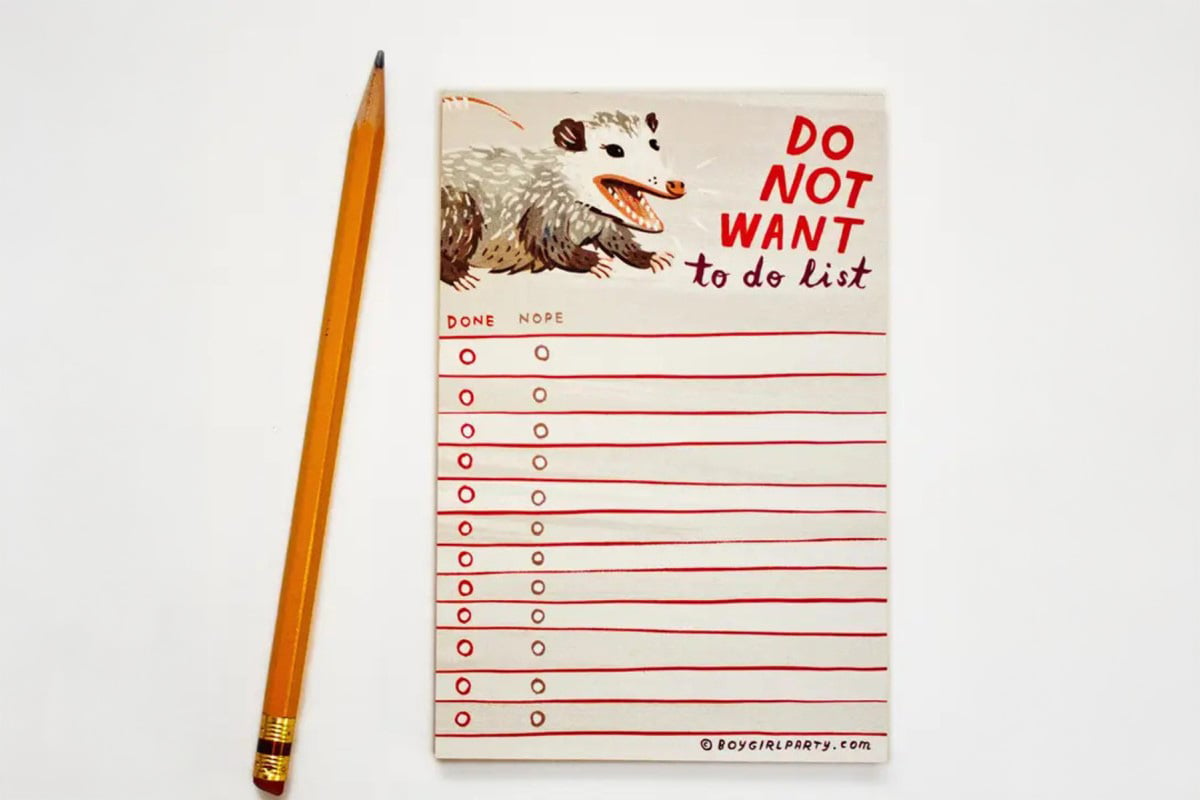 notepad with pencil featuring opossum