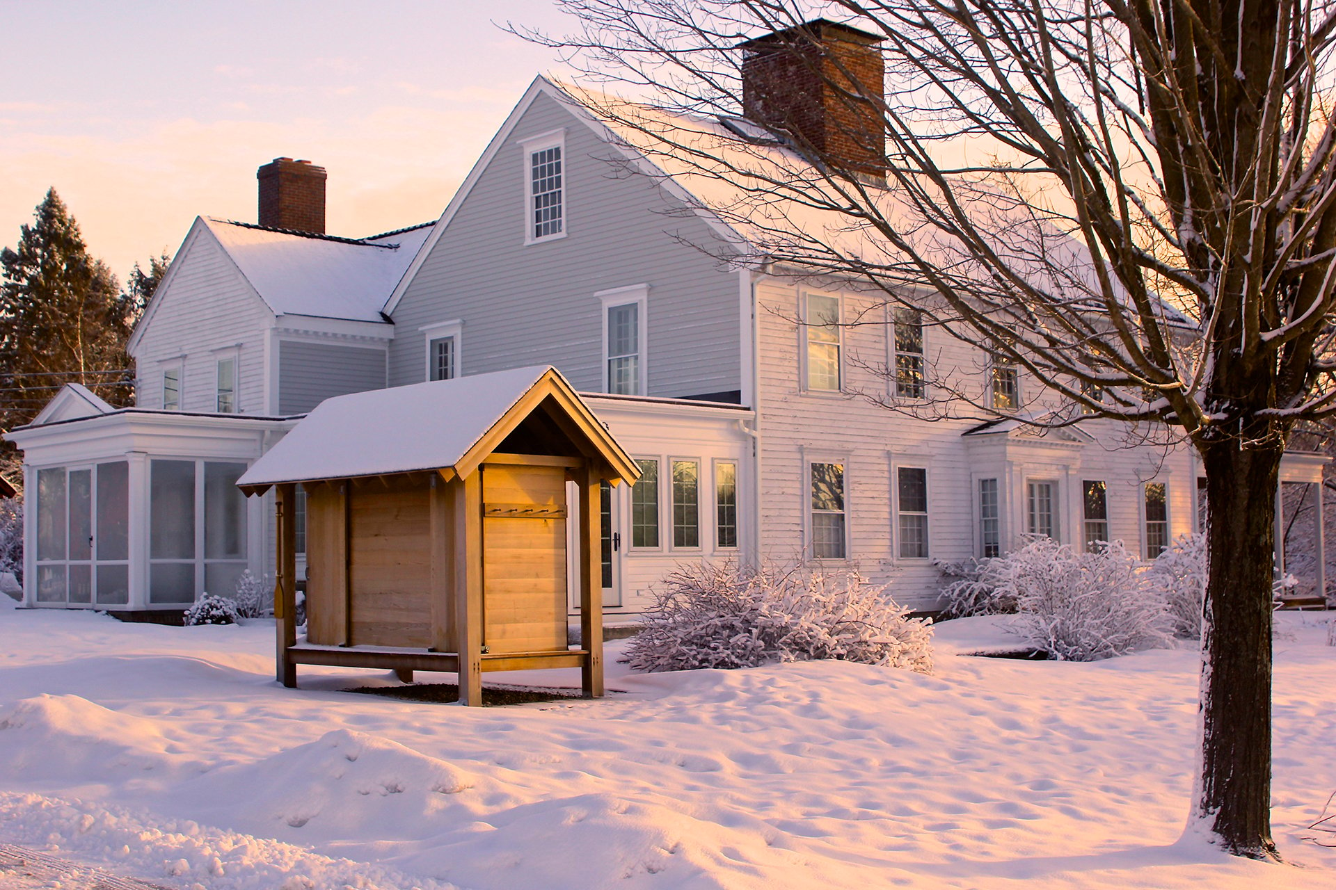 Bradstreet House under a light layer of snow