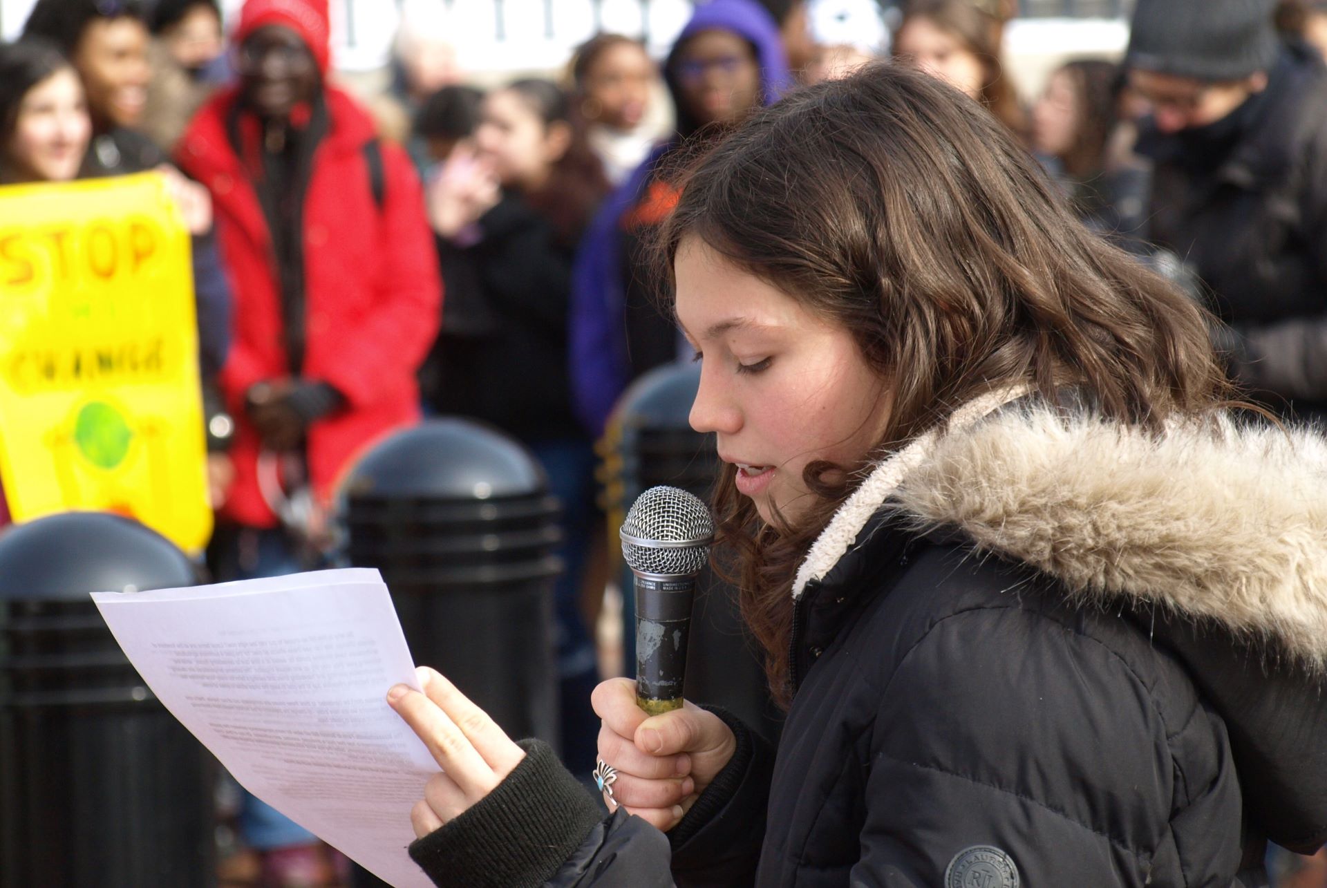 A YCLP student speaks into a microphone during YCLP lobby day.