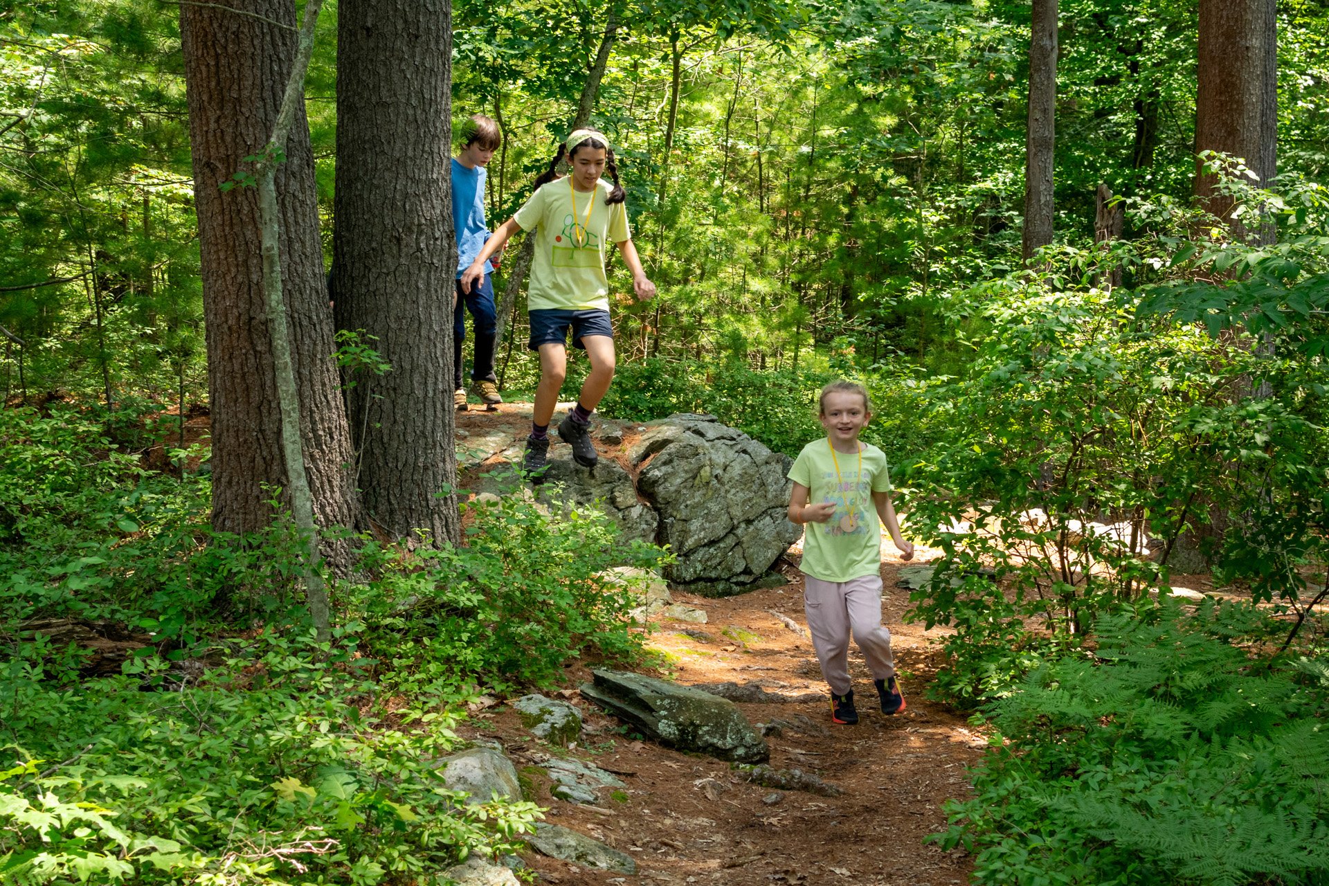 Broadmoor Campers walking in the woods